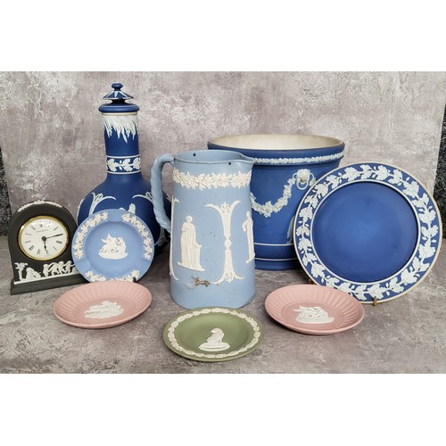 148 - Decorative Ceramics- Wedgwood Jasperware including a basalt mantel clock; globe and stem ewer; water... 