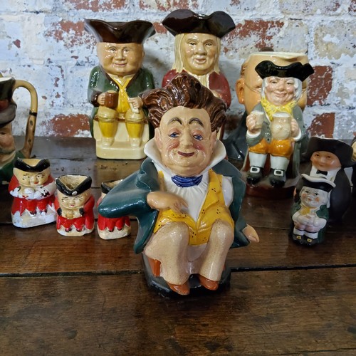 164 - A collection of Toby jugs including Woods & Sons No.1 Toby jug, Father Neptune, Wedgwood Unicorn... 