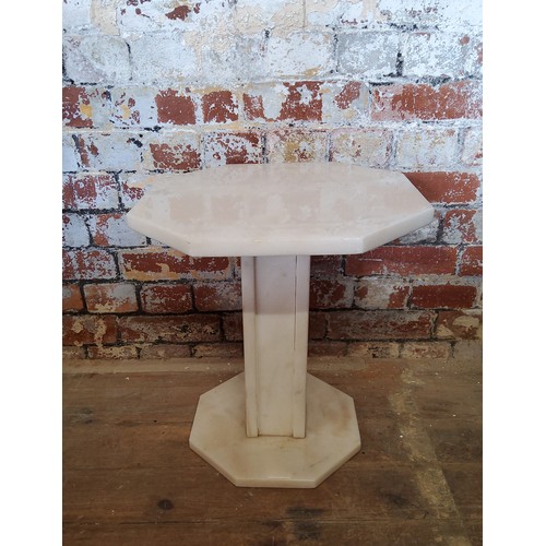 172 - Small marble hexagonal table top stand,top is not fixed to plinth.Height 45cm x depth 40.5cm x width... 