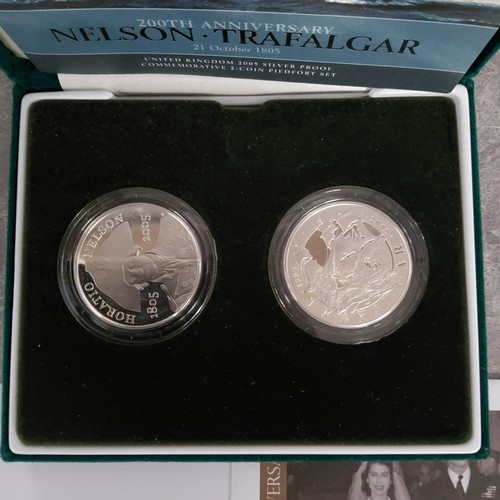 204 - Numismatics - Various silver commemorative proof coins including The 200th anniversary Nelson Trafal... 