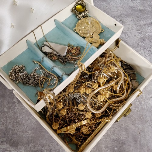 218 - A jewellery box with silver chains, gold plated and yellow metal necklaces, pendants etc