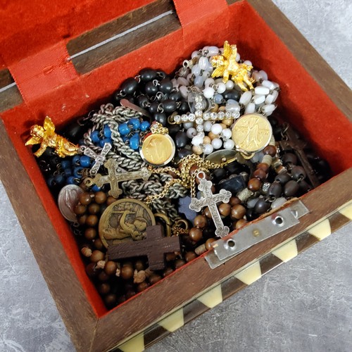 223 - Religious prayer beads, silver Cross and other corpus christi necklaces, yellow metal cherubs, etc i... 