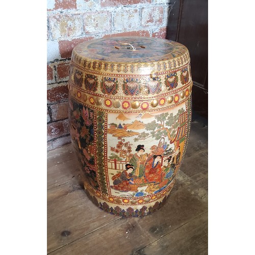 95A - A Japanese satsuma garden seat decorated with samurai warriors and gold geometric borders.Height 46c... 