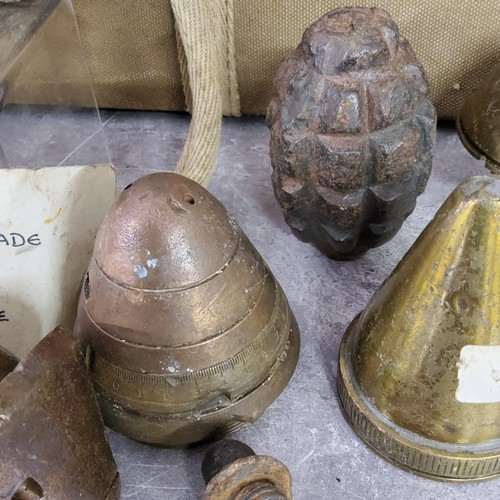 51 - Militaria - A British WWI No. 15 ball hand grenade, French Limon grenade; other ammunition fragments... 