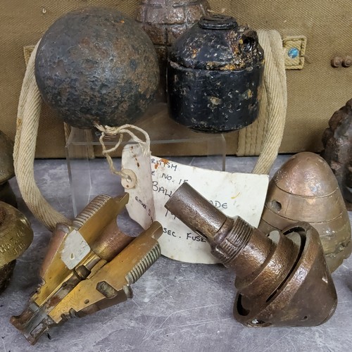 51 - Militaria - A British WWI No. 15 ball hand grenade, French Limon grenade; other ammunition fragments... 