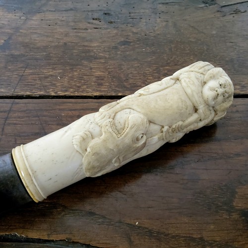 70 - A signed Meiji Period Japanese walking cane, the novelty carved bone pommel carved as a Samurai warr... 