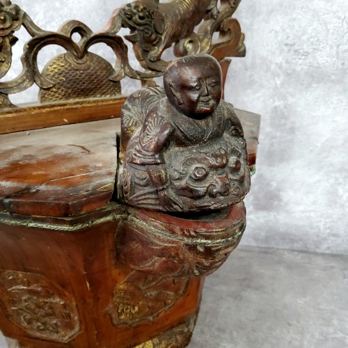 79 - An unusual cinnabar lacquered Chinese rice basket, with Dog Of Fo and blossoming carved carrying han... 