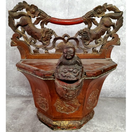 79 - An unusual cinnabar lacquered Chinese rice basket, with Dog Of Fo and blossoming carved carrying han... 