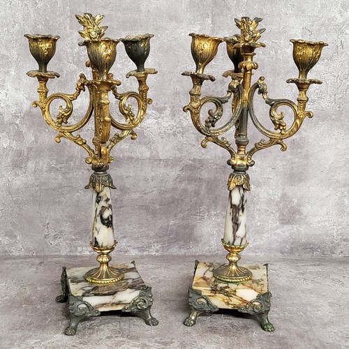 93 - A pair of 19th century French gilt metal mounted marble three branch candlestick garnitures c.1860, ... 