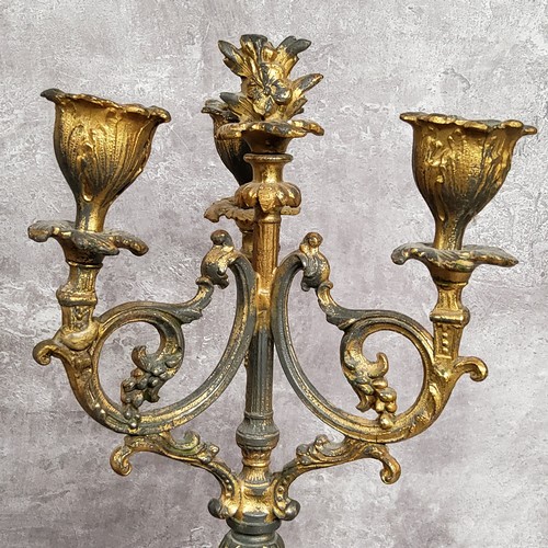 93 - A pair of 19th century French gilt metal mounted marble three branch candlestick garnitures c.1860, ... 