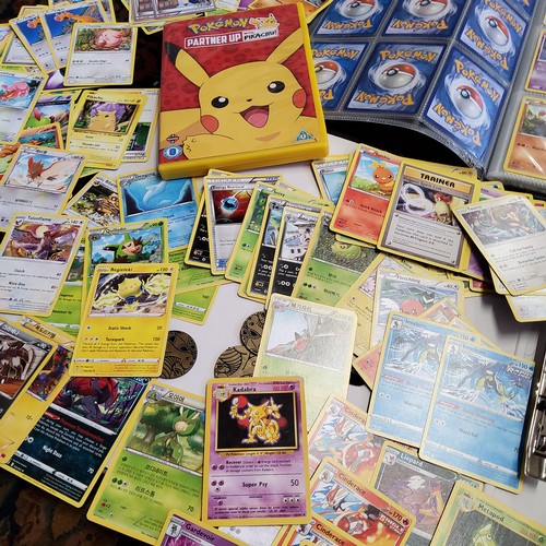 282 - Pokemon Cards - a collection of 1995 Basic pokemon Cards and later including a Basic Kadabra, Vulpix... 