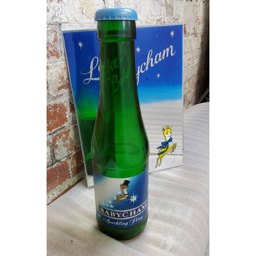 51 - Advertising - A vintage Babycham sparkling Perry oversized bottle; a Love a Babycham pictorial adver... 