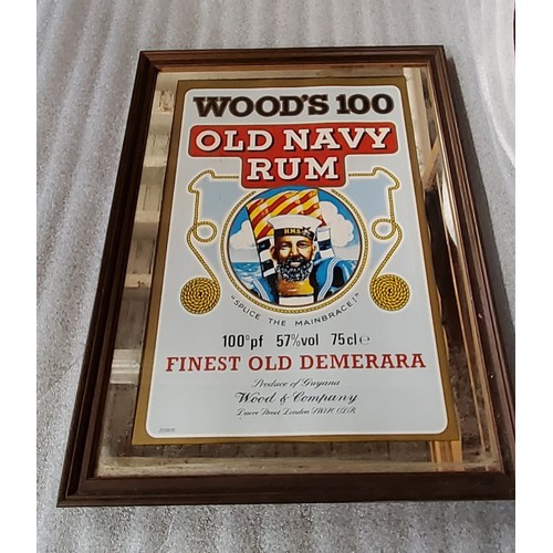 54 - Advertising - a Wood's 100 Old Navy Rum mirror, framed h. 45cm x w. 35cm