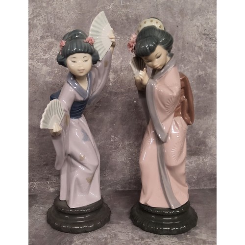 71 - Lladro figures including 'Be Quiet' no. 4522; Girl trying on Lipstick no.1083; Girl Manicuring 1082;... 