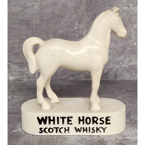 63 - Advertising a vintage White Horse Whisky chalkware bar display horse, brand name embossed in relief ... 