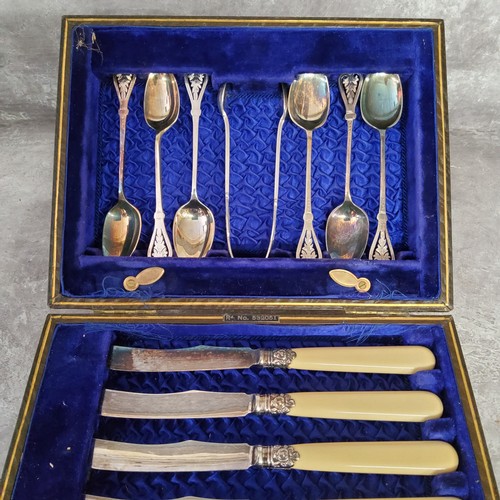 125 - A cased silver plate high tea set for six comprising tea spoons, sugar nips, butter knifes & cak... 