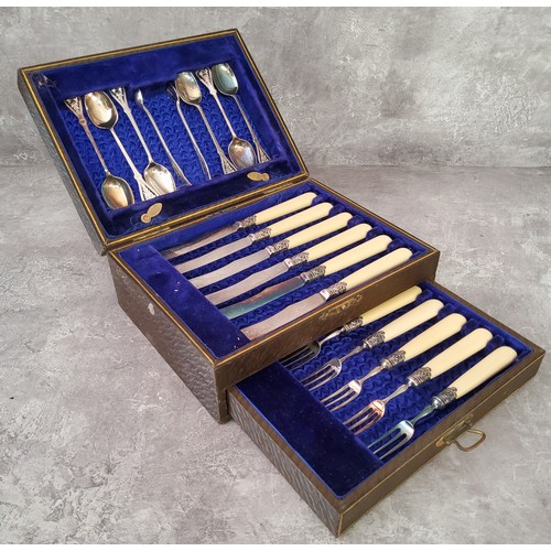 125 - A cased silver plate high tea set for six comprising tea spoons, sugar nips, butter knifes & cak... 