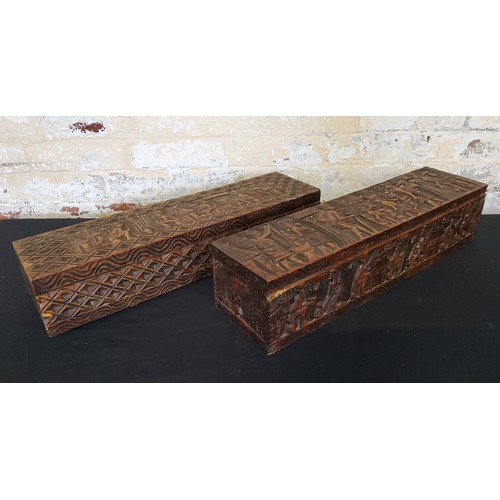 130 - Tribal - two hand carved African boxes with hinged lids, two carved trays with two small original oi... 