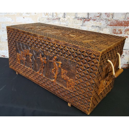 133 - Tribal - Large hand carved chest with hinged lid, carvings to top and all sidesHeight 42.5cm x width... 