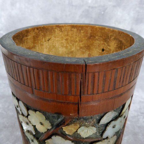 145 - A Chinese bamboo brush pot, Bitong, decorated with mother of pearl and bone applied elder amongst a ... 