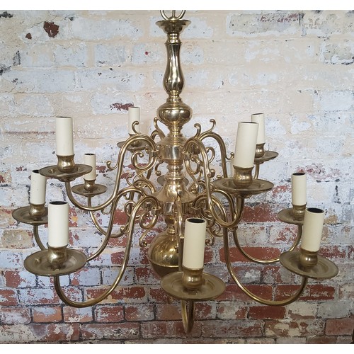 168 - A Dutch style brass 12 branch chandelierHeight 70cm x dia 75cm, (total height with chain 133cm)... 