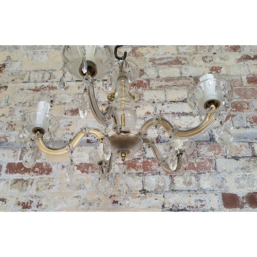 173 - A brass and crystal candle 5 branch chandelierHeight 45cm x dia 51cm, (total height with chain 58cm)... 