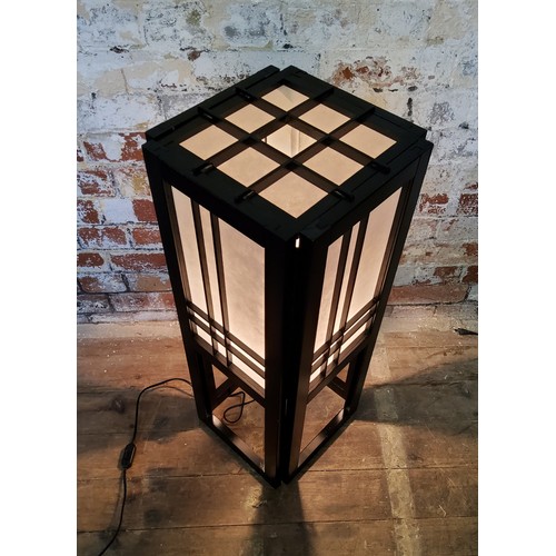 185 - A traditional Japanese black lacquer floor lamp with cream fabric insets.Height 76cm x width 31cm x ... 