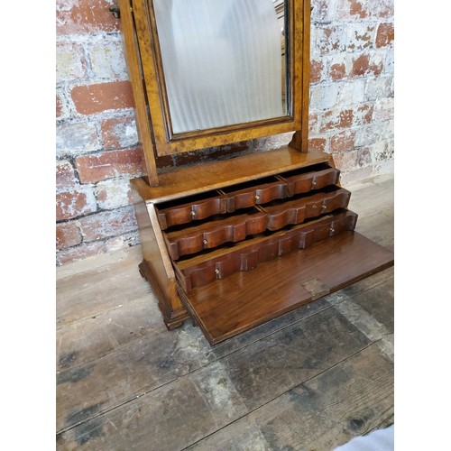 208 - A George II feather banded burr walnut dressing table mirror, fall front housing six drawers He... 