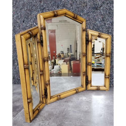 261 - A faux bamboo three section table top mirror, with hinged side panesHeight 55.5cm x width 65.5cm x d... 