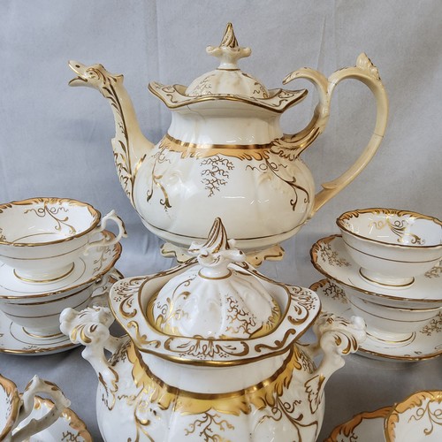 8 - A Victorian 'Rockingham' part tea service, marked 564 to base including teapot, sugar bowl and cover... 