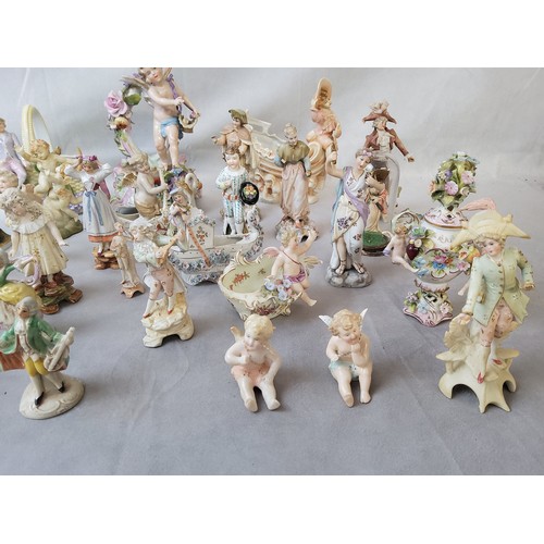 10 - A collection of 19th century German and Continental porcelain and bisque porcelain fairlings,  ... 