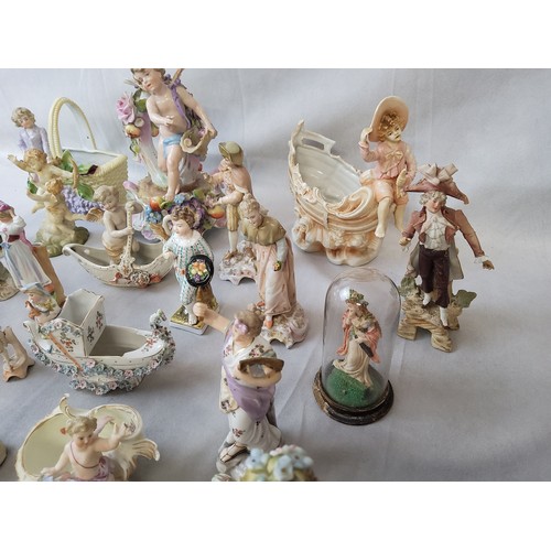 10 - A collection of 19th century German and Continental porcelain and bisque porcelain fairlings,  ... 