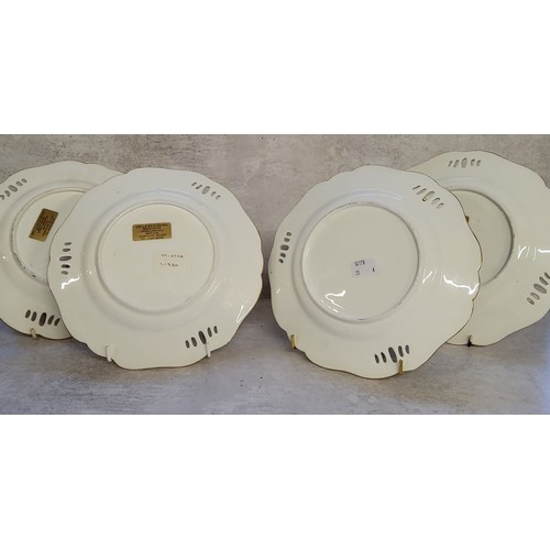 14 - Four early 19th century wavy edge cabinet plates, possibly Minton, the apple green plates with centr... 