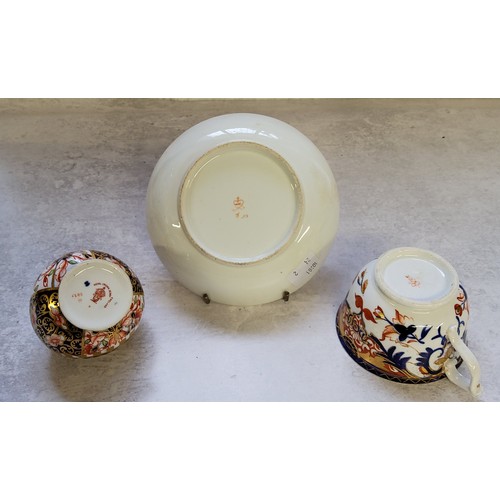 21 - A Royal Crown Derby 1299 pattern small salt pig 9cms high, c.1905; a Royal Crown Derby teacup & ... 