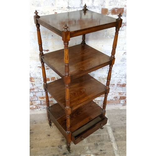 46 - A good early 19th century rosewood four-tier whatnot, fitted with a single drawer to the base, raise... 