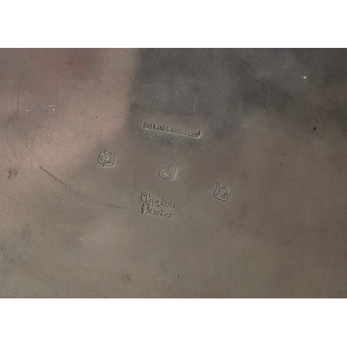 67 - An unusual Celtic style pewter pedestal bowl, the base embossed in relief with Celtic symbols, the b... 