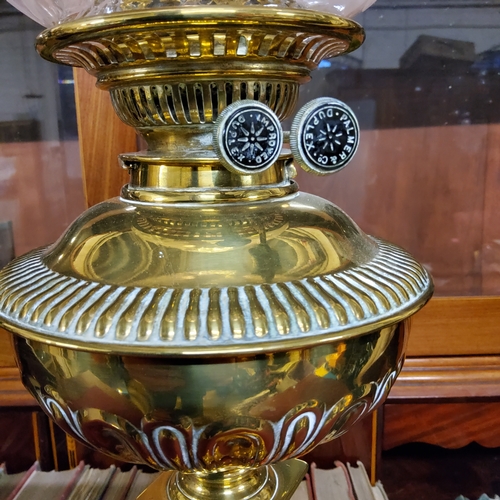 76 - A substantial Victorian highly polished brass oil lamp with shade c.1880