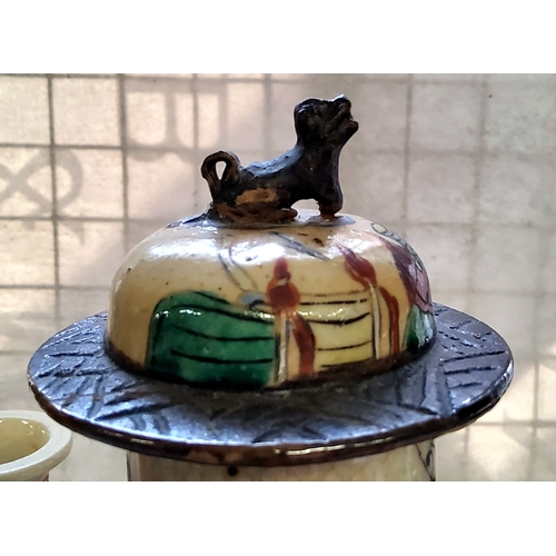 83 - Oriental Ceramics - a 19th century Japanese baluster shaped temple vase and cover on stand, decorate... 