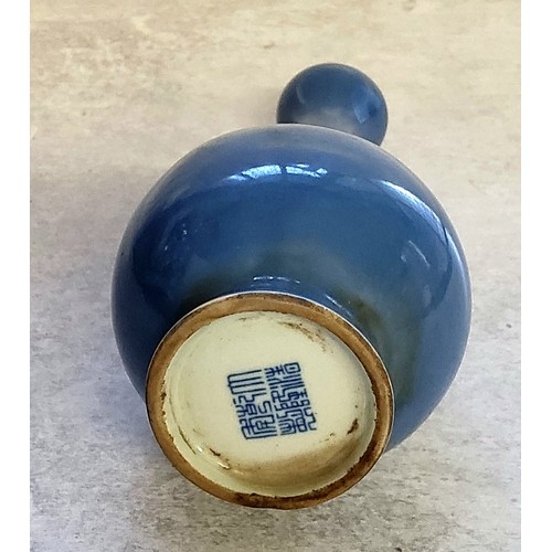 86 - A Chinese double gourd bud vase, powder blue glaze with seal stamped mark to base.