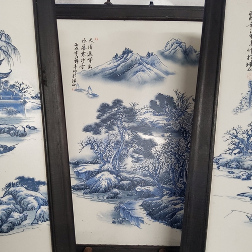89 - Oriental Ceramics&nbsp; - A Chinese blue and white decorated porcelain triptych in hardwood wall han... 
