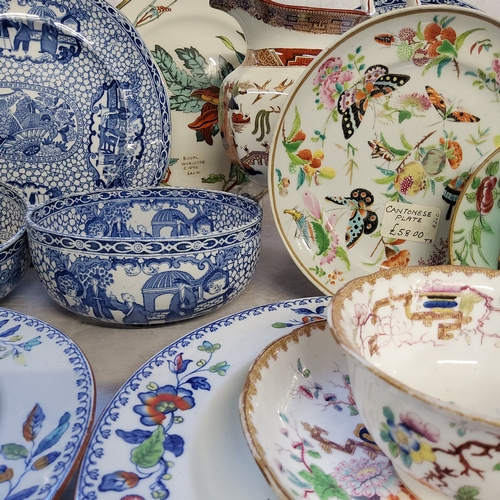 90 - A 19th century Cantonese cabinet plate, seal stamped base; another smaller; 19th century hard paste ... 