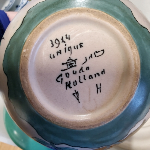 97 - Gouda Pottery - a collection of Gouda pottery examples including ewer, bowls, cabinet plates etc