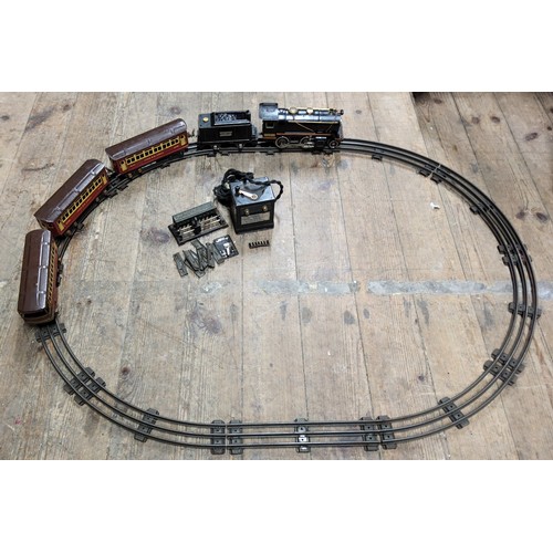 280 - Lionel Ives pre-war O gauge transition 257 2-4-0 steam locomotive and 257T tender, two Pullman coach... 
