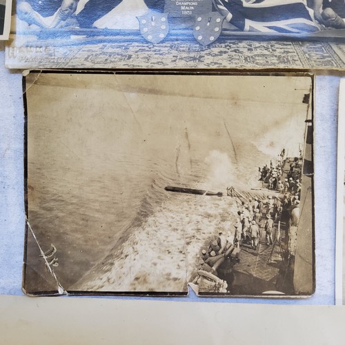 65 - British Navy photographs and RP postcards including a British Submarime entering Venice; a ship laun... 