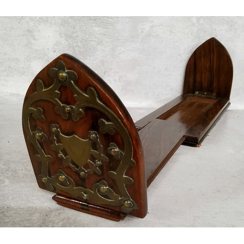 73 - A Victorian coromandel and brass extending book trough, c.1860, vacant cartouche. Measures 33cm clos... 