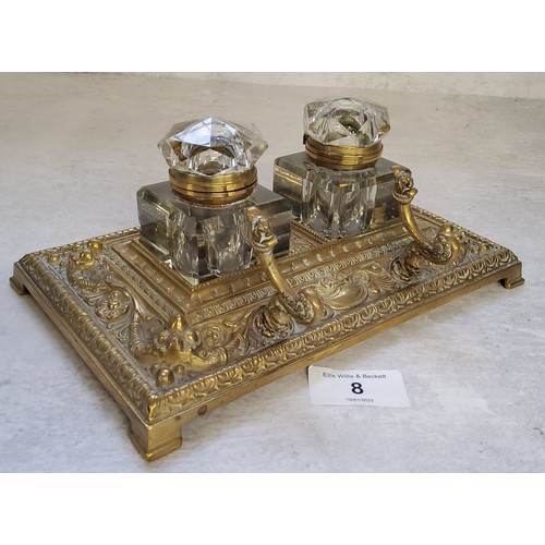 8 - A late 19th century desk top two ink bottle and pen stand deocrated in relief swags & flowers, a... 