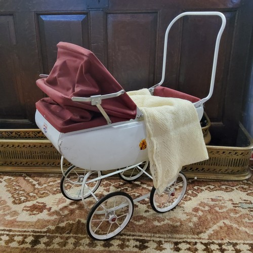 289 - A Tri-ang childs sprung pram, white with burgandy cover c.1950s
