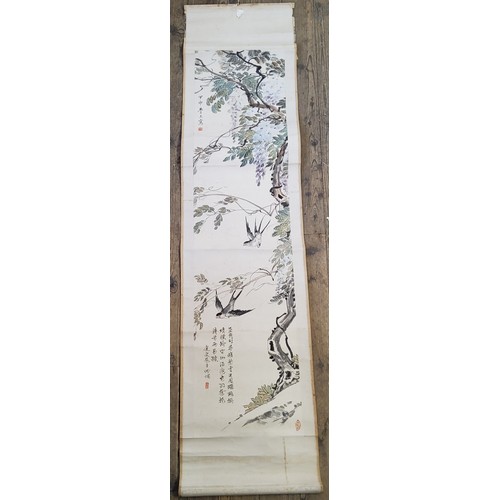 5 - An early 20th century Chinese hanging calligraphy scroll, Qing dynasty,
painted with swallows and Wi... 