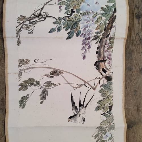 5 - An early 20th century Chinese hanging calligraphy scroll, Qing dynasty,
painted with swallows and Wi... 