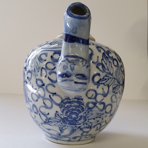 16 - Oriental Ceramics - a Qing underglaze blue and white teapot decorated with dragon, six character mar... 